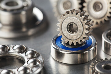 Obraz premium Gears, bearings and mechanism parts.Elements of mechanical blocksand construction.