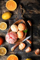 Citrus fruits on a wooden background