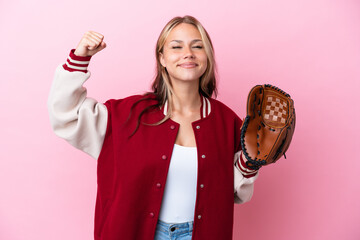 Player Russian woman with baseball glove isolated on pink background doing strong gesture