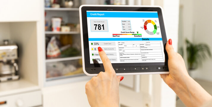 Close-up Of A Businessman Checking Credit Score Online On Cellphone While Having Coffee