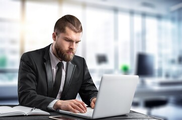 Fototapeta premium Happy smiling professional businessman sitting at office
