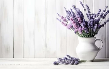 Rolgordijnen fresh lavender flowers and herbs on white wooden table background © Oleksiy