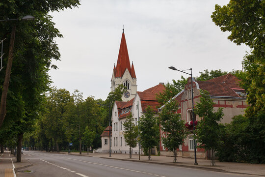 Silute Evangelical Lutheran Church, located in the center of Silute. The height of the church tower reaches 50 m, and the tower clock is the largest in Lithuania.