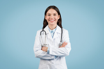 Smiling female doctor with stethoscope - obrazy, fototapety, plakaty