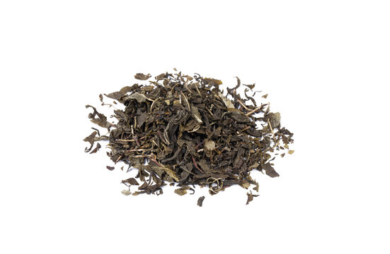 Dried green tea on the white background