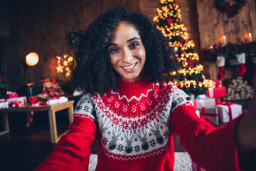 Portrait of lovely positive person toothy smile make selfie evergreen new year tree illumination decor apartment inside