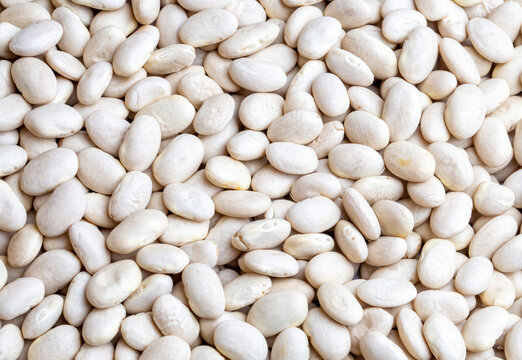 White haricot beans on the white background