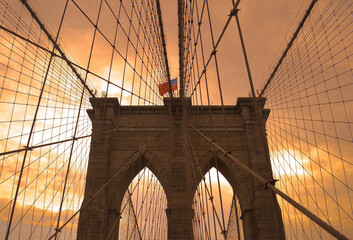 Fototapeta premium New York Brooklyn bridge soleil couchant