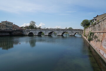 Fototapeta na wymiar Famous and old Tiberius bridge, Ponte Di Tiberio in Rimini, Italy