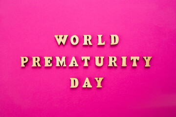 World Prematurity day concept. Banner with the inscription in wooden letters