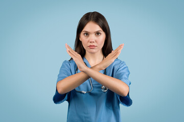 Nurse with crossed arms in a no gesture - obrazy, fototapety, plakaty