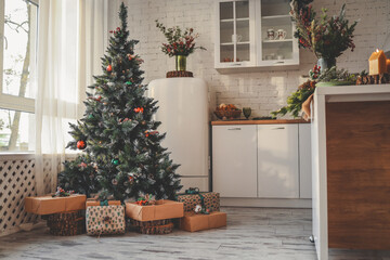 Fototapeta na wymiar Interior of kitchen with glowing Christmas trees
