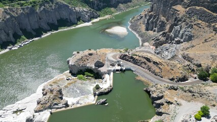 High-angle shot of buildings in the Shoshone Falls Park and the Snake river in the background