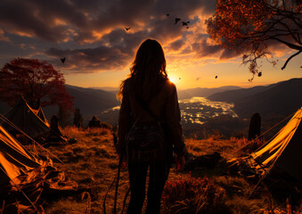 The Adventurous Woman Leading a Camping Expedition at Sunset