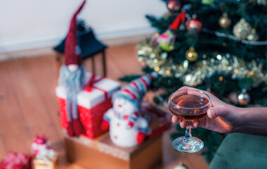 woman holding liquor in hand celebration, Concept of holiday party and pleasure.