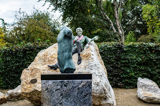 Danny Osborne's sculpture of a male torso representing Dionysus, the Greek God of drama and wine set against his sculpture of Oscar Wilde