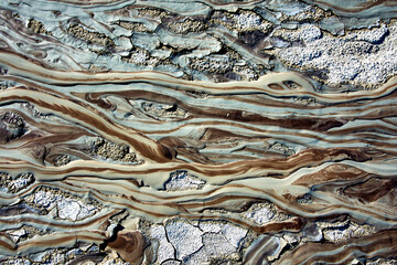 cones of mud volcanoes from which rivers of mud flow