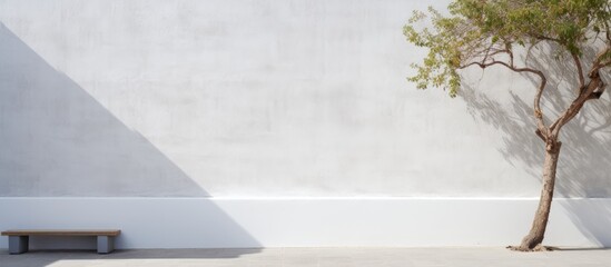 Obraz premium The vintage houses white cement wall displayed an abstract pattern with an intricate texture adding depth and character to the overall design creating a captivating background that blended h