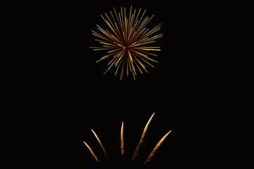 New Year's Night, Diwali, bonfire night Colourful Starbursts and Rocket Explosions on Black...
