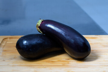 fresh eggplant on table