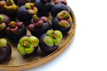 Fresh mangosteen fruit on white background.