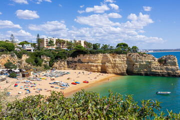 View of the beautiful beach of Lady of the Rock (Praia Senhora da Rocha), on a beautiful summer day. Porches, Lagoa, Algarve, Portugal - obrazy, fototapety, plakaty