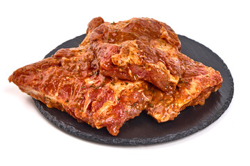 Raw bbq ribs, marinated meat for grill, isolated on white background.