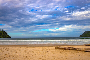 Fototapeta na wymiar Beautiful landscape of a sandy beach on a cloudy day
