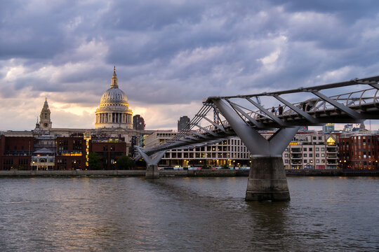 Millennium Bridge over River Thames leading to St Paul's Cathedral, London, England, UK