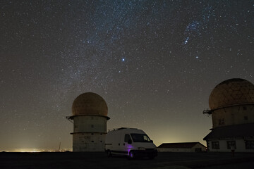 Winter Milky way with Orion constellation over Torre, the highest mountain in Parque natural da...