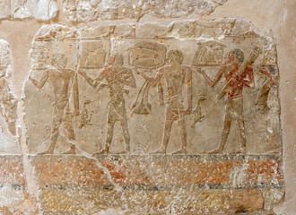 SAQQARA, EGYPT - MARCH 23, 2023:  Pictures from the inner walls  in the Saqqara necropolis, Egypt...