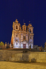 Fototapeta na wymiar Church of Santo Ildefonso in Porto with blue tile called Azulejos illuminated at night, Porto, Portugal,