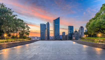city square and skyline with modern buildings at sunset