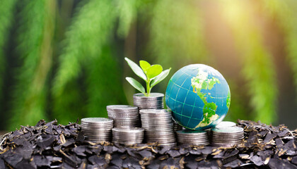 green globe with world map and stack of silver coins the seedlings are growing on top concept of green business finance and sustainability investment carbon credit money saving investment
