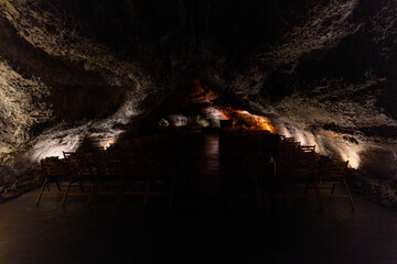 cueva de los verdes, colorful vulcanic rocks in cave with lake still calm reflecting, lava tube in Lanzarote, Canary Islands