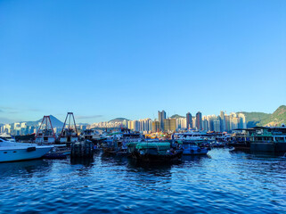 Ships dock at the Shau Kei Wan typhoon shelter harbor area, Hong Kong.