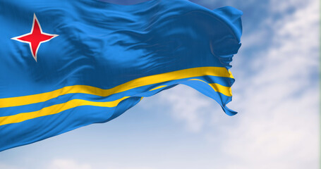 Flag of Aruba waving in the wind on a clear day