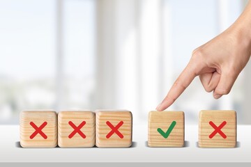 Choosing the option concept, Hand hold wooden cube