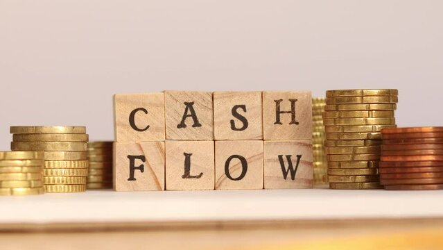 The words Cash Flow are stacked on top of each other as block letters