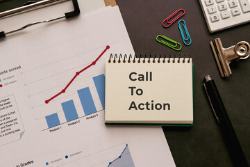 There is notebook with the word Call To Action. It is as an eye-catching image.