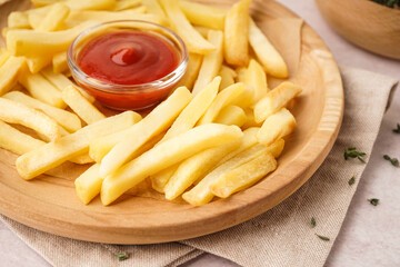 Plate with tasty french fries and ketchup on white background
