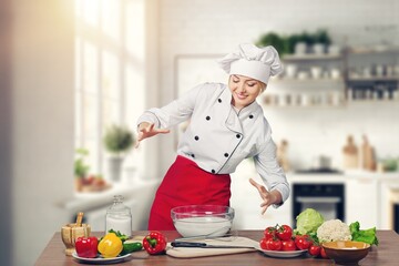 Young woman bakery making food in the kitchen.