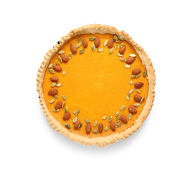 Delicious pumpkin tart with almond and seeds on white background