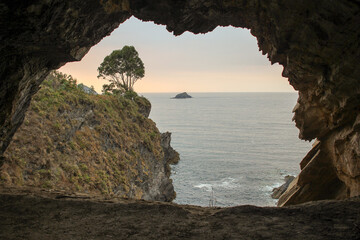 a view of the sea from inside Cova Da Doncella in Viveiro, Spain