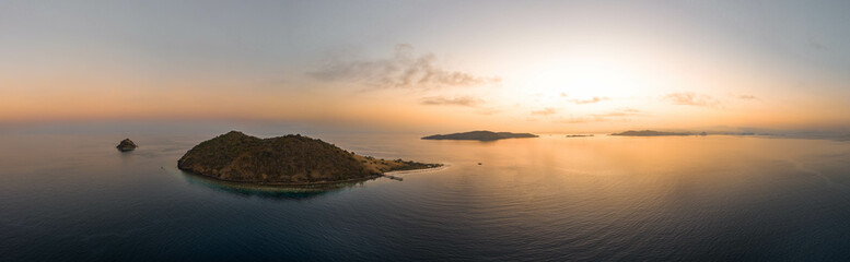 Tropical islands at sunset, beautiful aerial panoramic drone shot