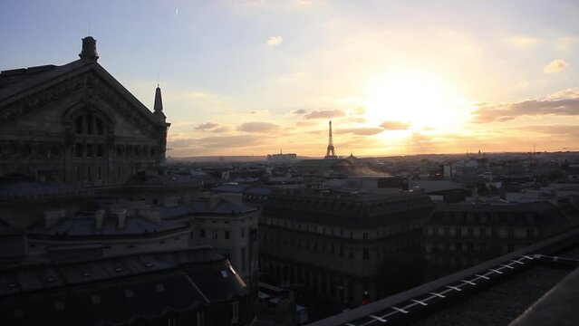 View of Paris at Sunset with Eiffel Tower from The Rooftop at the Galeries Lafayette, Paris, France. 