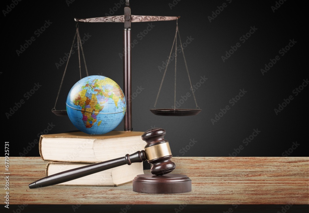 Sticker International Law. Green World and wooden gavel