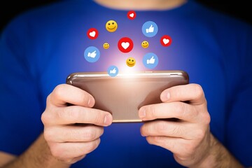Young person hold smartphone with social images