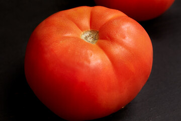 Fresh ripe red tomato. Vegetable, cooking ingredient photograph.
