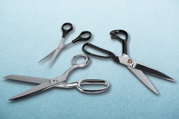 A pair of steel school scissors on a desk